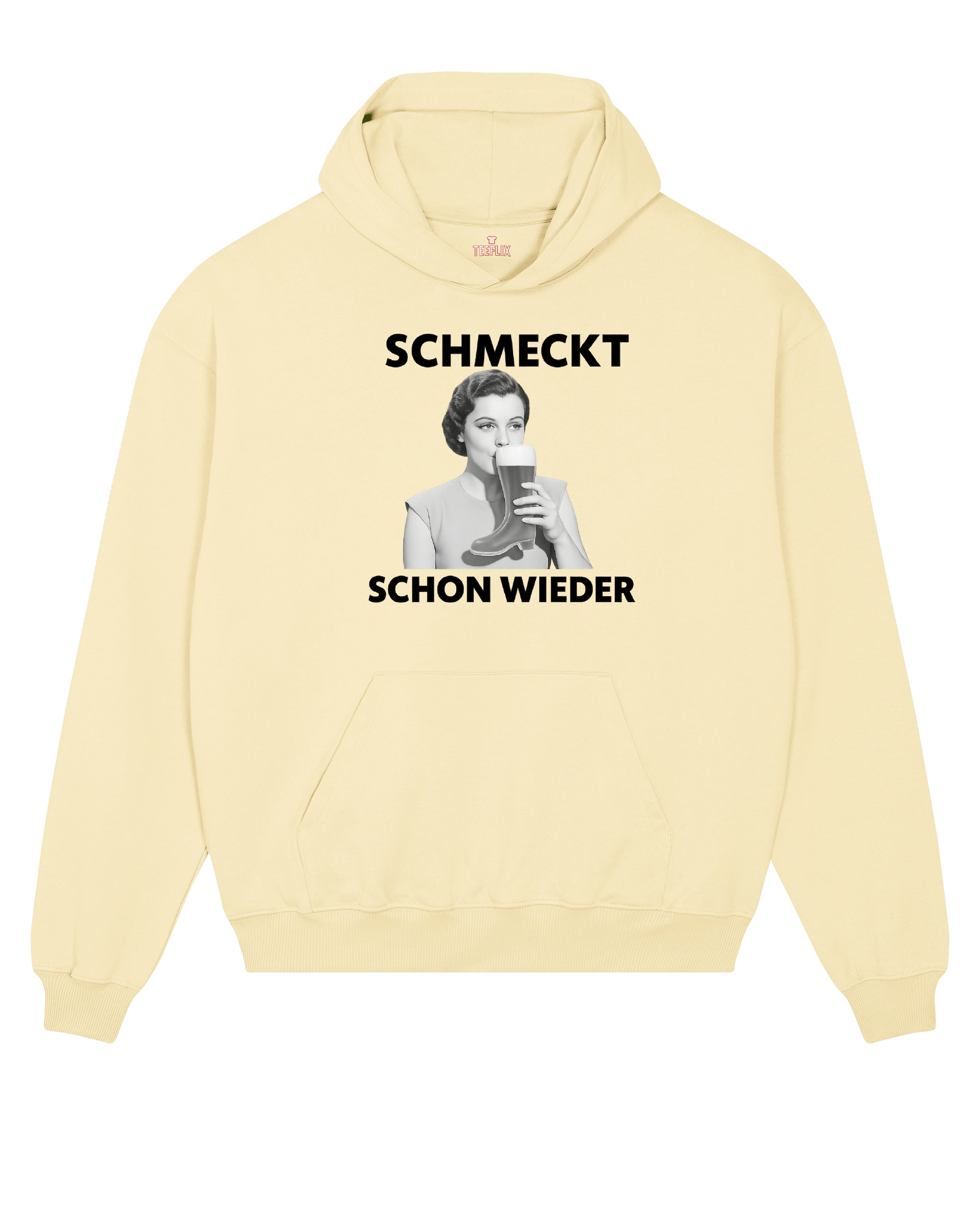 Ein weißer, cremefarbener oder schwarzer Hoodie mit dem humorvollen Spruch „Schmeckt schon wieder“ über einer Retro-Illustration einer Frau, die aus einem Bierstiefel trinkt. Perfekt für Bierfans mit Sinn für Humor.